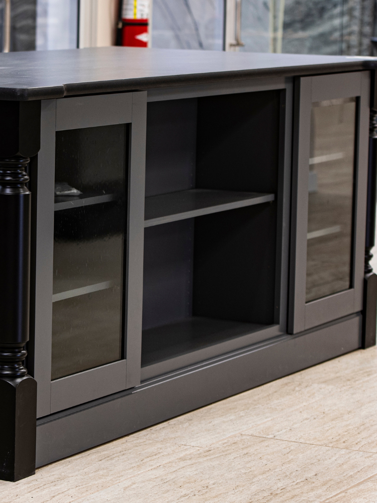 Gray pull out cabinet with built-in storage for pots and pans