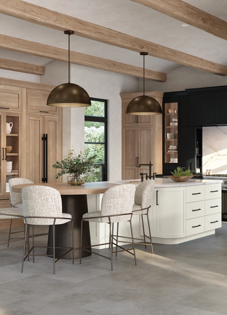 Gray tile flooring in a kitchen with custom cabinetry
